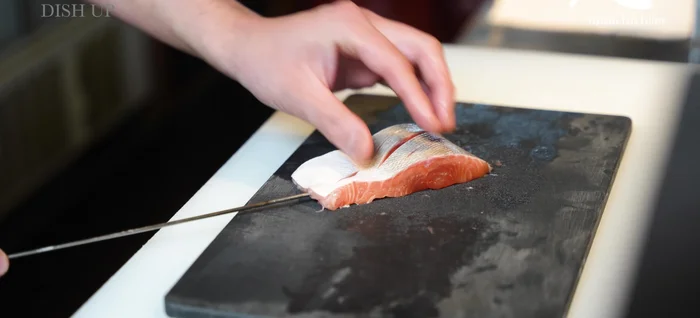 Skewer the cherry salmon fillets.