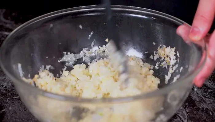 Mix breadcrumbs and milk. Add half a beaten egg and mix thoroughly. Adding the egg later prevents coagulation.