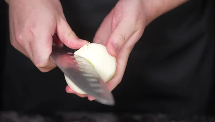 Finely chop the onion. The finer, the better for easy blending with the meat.