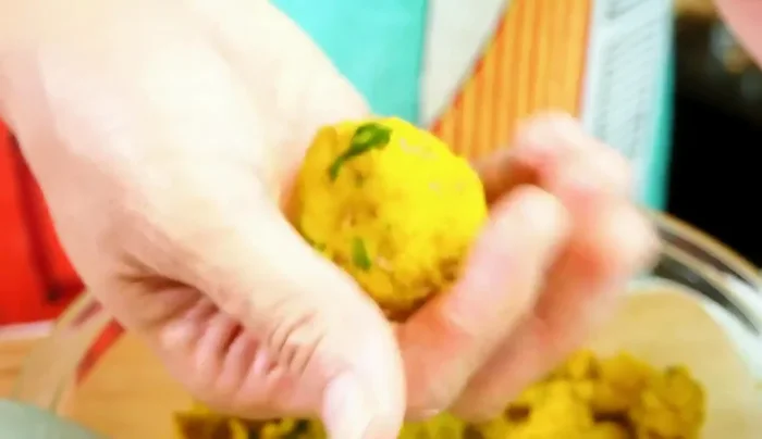 Form the pumpkin mixture into balls, make an indent in the center with your thumb.