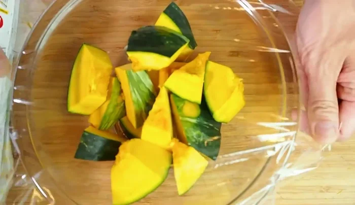 Microwave the pumpkin pieces (covered with plastic wrap) for 6 minutes, or until soft.