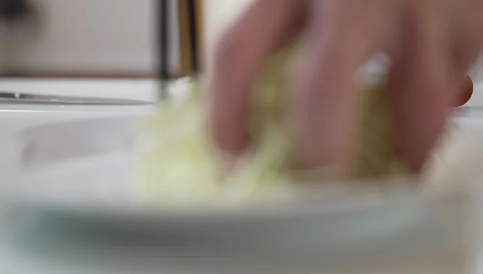 Plate the cabbage and add tomatoes if desired.