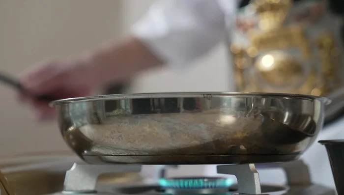 Heat olive oil in a frying pan over medium-high heat. Spread the pork evenly and cook for about a minute on each side until golden brown.