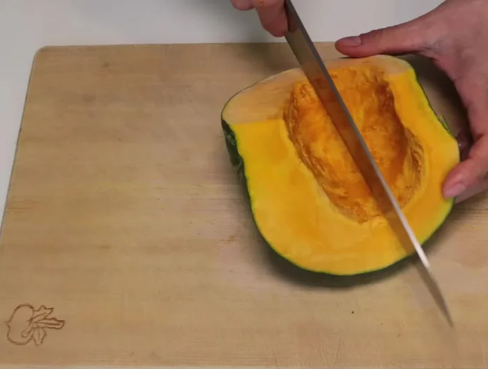 Cut the pumpkin into chunks.