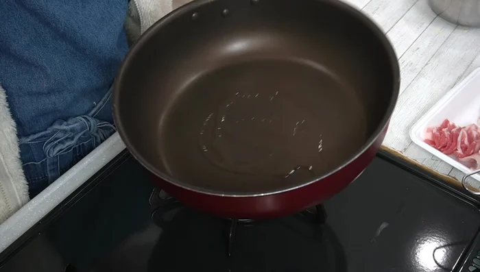 Heat salad oil in a frying pan. Cook the egg mixture on medium heat until half-cooked, then remove from heat and set aside.