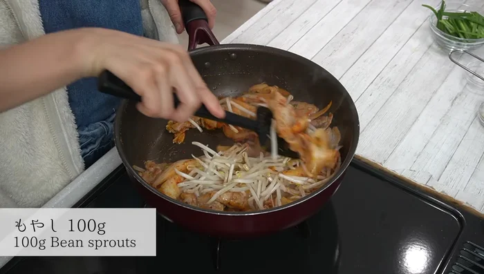 Add bean sprouts and stir-fry.