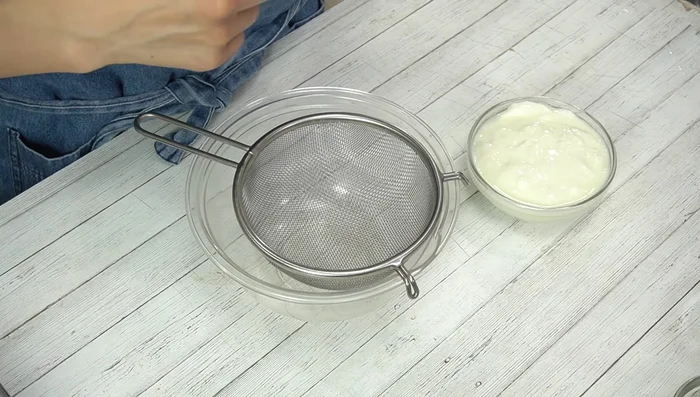 Drain the yogurt: Line a sieve with kitchen paper, add the yogurt, and let it drain for 30-60 minutes.