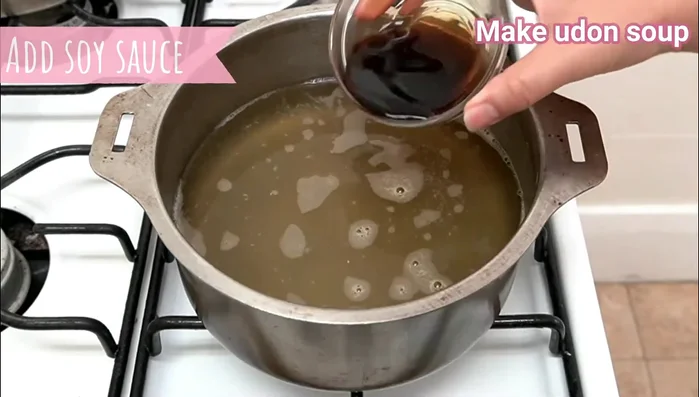 Combine the cooked udon noodles with the prepared sauce and any additional ingredients. (Refer to the video for detailed instructions)