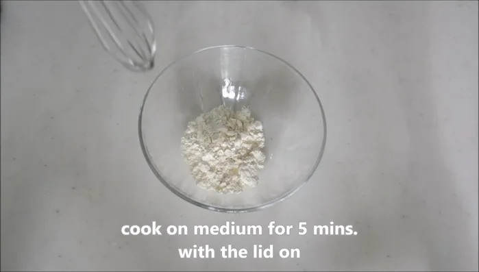 Mix flour and water to make a batter, similar in consistency to tempura batter. [51.52]