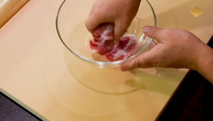 Marinate beef with sugar, sake, soy sauce, and mirin for at least 15 minutes.