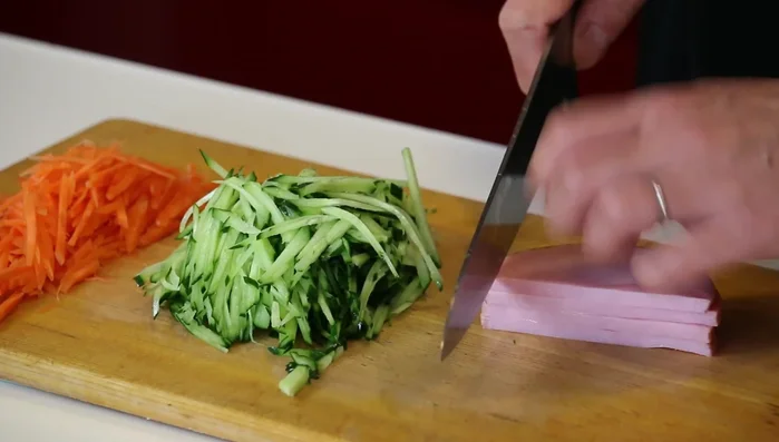 Cut the ham into halves.