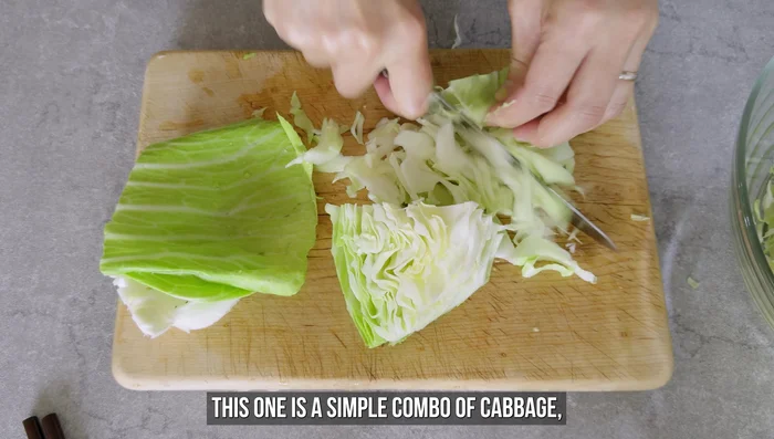 Cabbage Salad: Shred cabbage, sprinkle with salt, and let it sit. Add drained canned tuna (or omit and add kombu powder/soy sauce). After 5 minutes, add torn nori seaweed, vinegar, soy sauce, and optional mayonnaise.