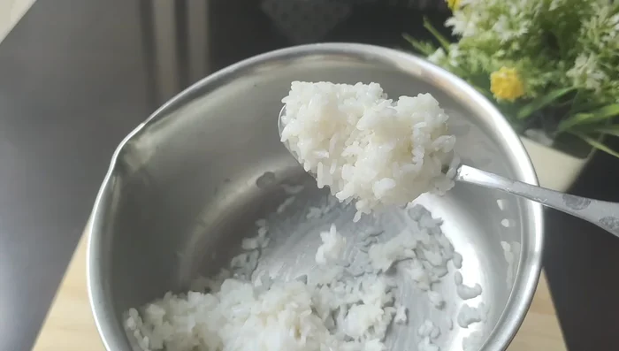 Grind the cooked rice into a smooth paste.