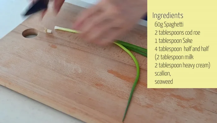 Cut tarako into small pieces for topping.