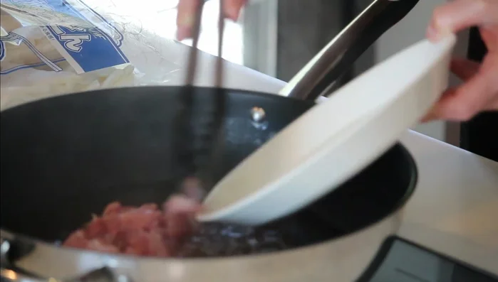 Add the chicken to the boiling broth and cook for about 5 minutes, or until cooked through. (178.879)