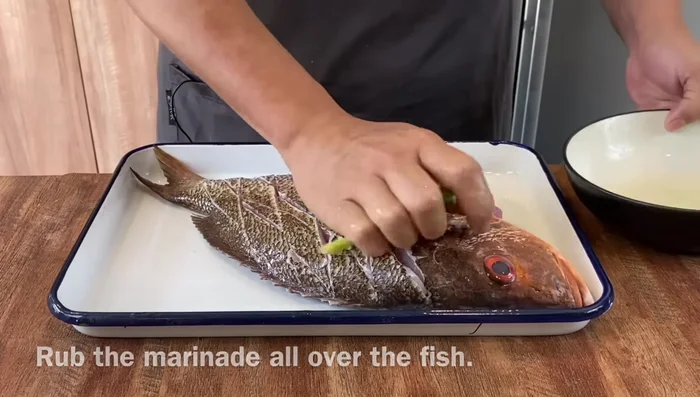 Marinate fish for 10 minutes, coating both sides with the marinade.