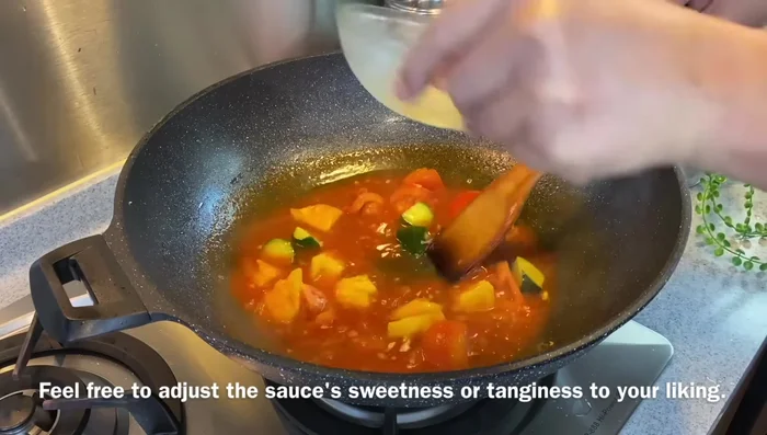 Add white vinegar; adjust sweetness/tanginess to taste. Thicken with cornstarch solution until desired consistency is reached.