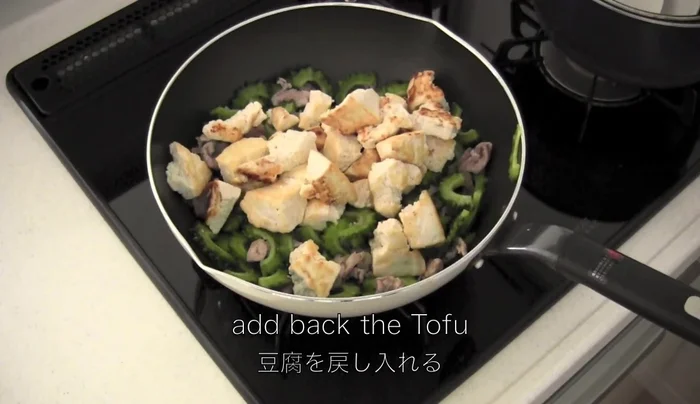 Add the cooked tofu back to the pan.