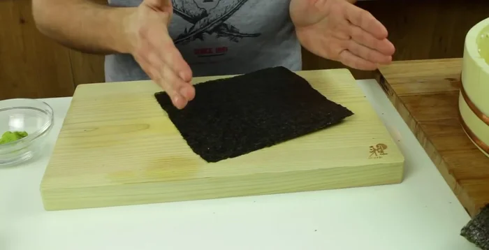 Cut a strip from a nori seaweed sheet.