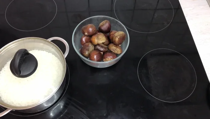 Preheat chestnuts in a pan with some water to soften the outer layer for easier peeling. Bring to a boil, then reduce heat and simmer for 5 minutes.