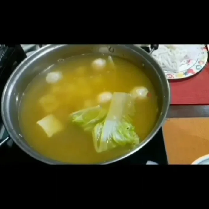 Prepare the seafood and vegetables. (Slice, chop, etc.)
