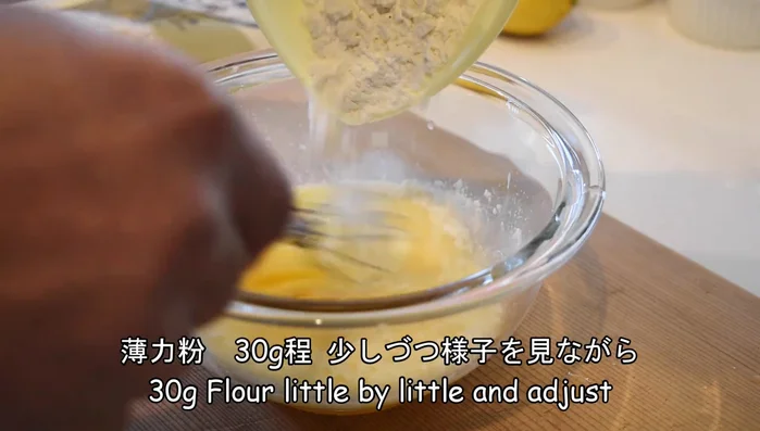 Prepare the batter: Mix flour gradually into a liquid batter, ensuring it's thin enough to create a delicate coating.