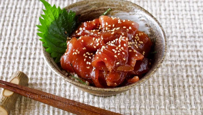 Garnish with green onions or chives and toasted white sesame seeds. You can also add extra fresh wasabi if desired.