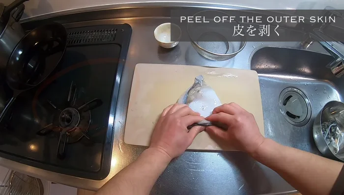 Pull off the skin of the squid body. Use your thumb to separate the skin from the meat and peel it off.