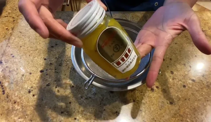Strain the syrup from the candied chestnuts; you only need the chestnuts.