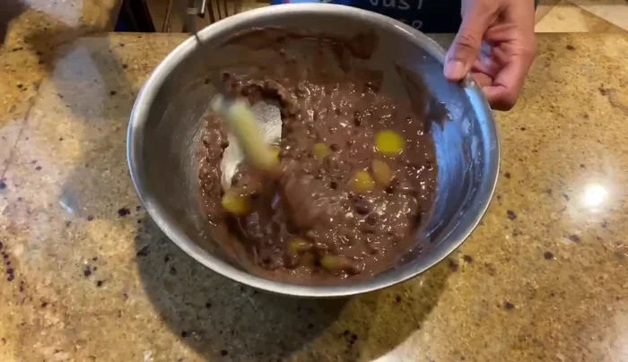 Add the candied chestnuts to the anko mixture.