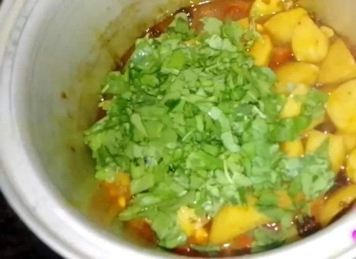 Add spinach and fenugreek. Mix well and cook for 10-15 minutes, allowing it to release its own water.