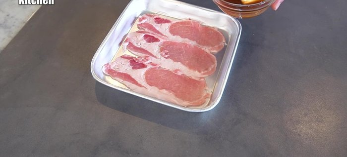 Spread miso paste on one side of the pork loin.