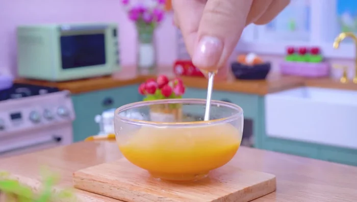 Prepare the sausage mixture: Whisk sugar and dry yeast, then add wheat flour, rice flour, and warm water. Let it rest.