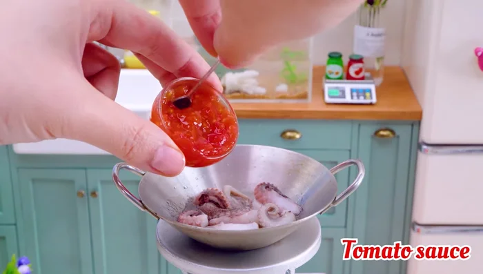 Mix octopus, tomato sauce, salt, black pepper, lemon, and parsley.