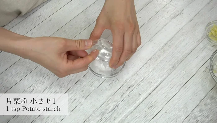 Prepare watered potato starch by mixing potato starch with water.