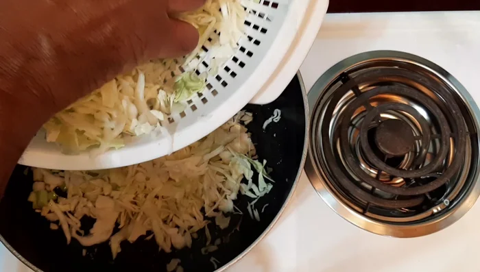 Add the cabbage to the pot.
