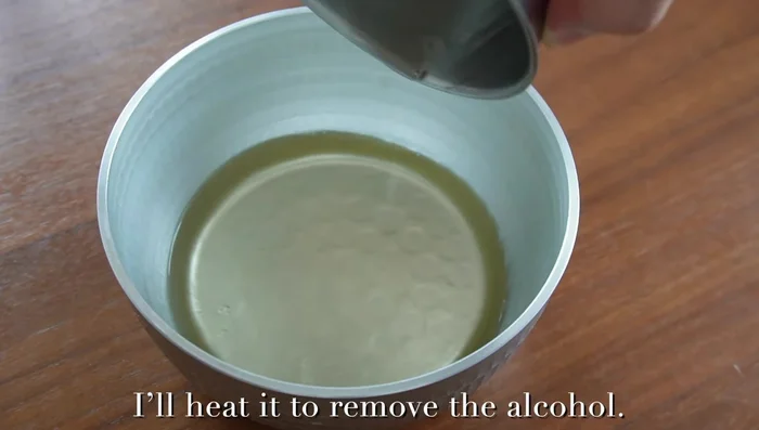Prepare Nasu Dengaku sauce: Combine sake, mirin, heat to remove alcohol, simmer. Add Hao and Shiro Miso, sugar, simmer until thickened (152.08).