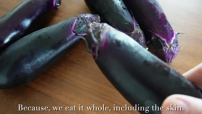 Prepare eggplant for Nasu Dengaku: Cut eggplant, make slits, sauté in olive oil until browned (235.48).