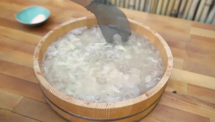 Rinse rakkyo to remove salt and debris.