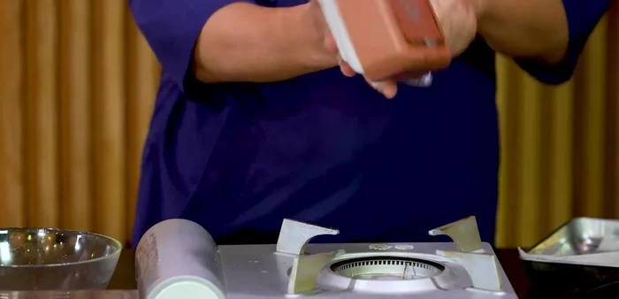 Remove from heat and shape the Dashimaki.