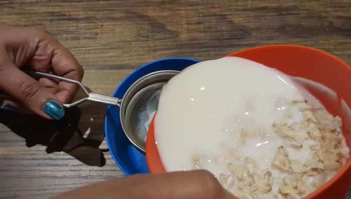 After 48 hours, strain the mixture through a strainer, pressing gently on the solids to extract all the liquid.