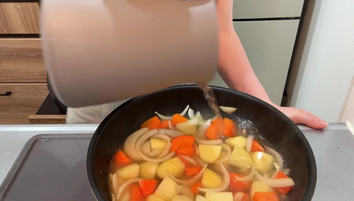 Add enough water to cover vegetables. Cover and cook until potatoes are tender.