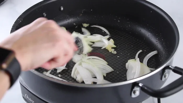 Add onions and cook until softened.