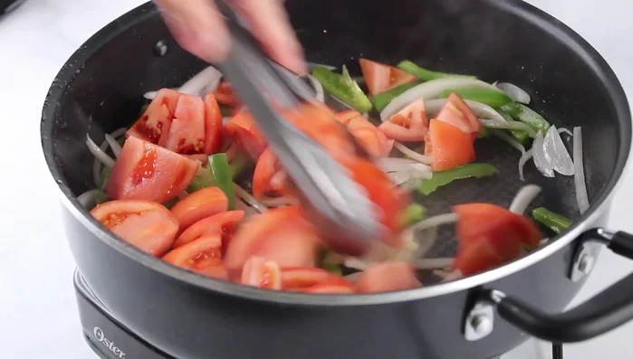 Add tomatoes and cook for 1-2 minutes until softened.