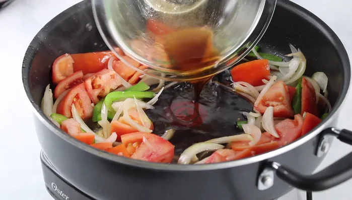 Add sauce and simmer until thickened. Mix everything together.
