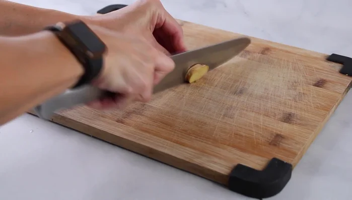 Prepare the ginger: Slice or grate a 1-inch piece of ginger.