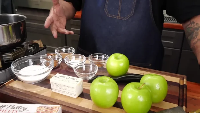 Thaw the puff pastry completely. Peel and dice the apples.
