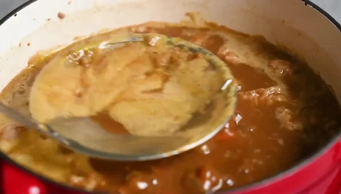 Simmer for 10-20 minutes until thickened. Serve hot with rice and pickles.