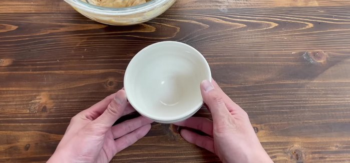 Pour the mixture into a rice bowl lined with plastic wrap.