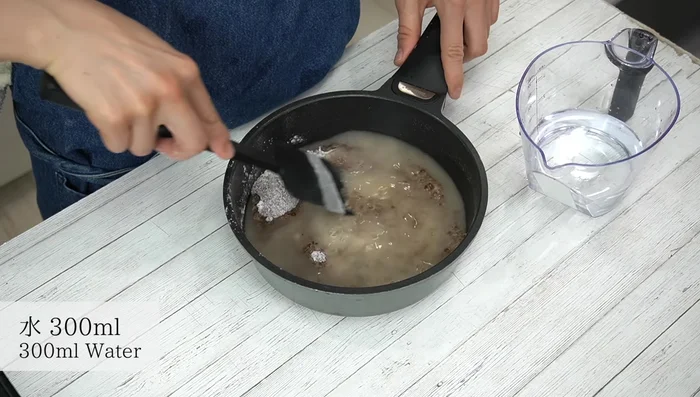 Gradually add water, mixing well after each addition, until about half the brown sugar is dissolved.